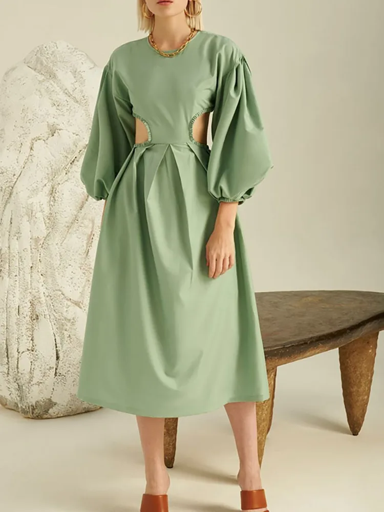 Was unterscheidet dieses Langarm -Leinenkleid von den anderen?